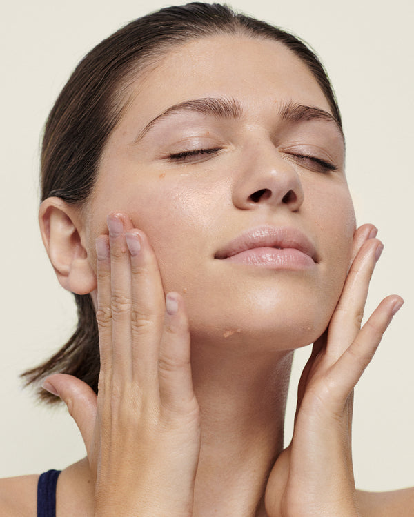 Model with Gotu Kola on her face